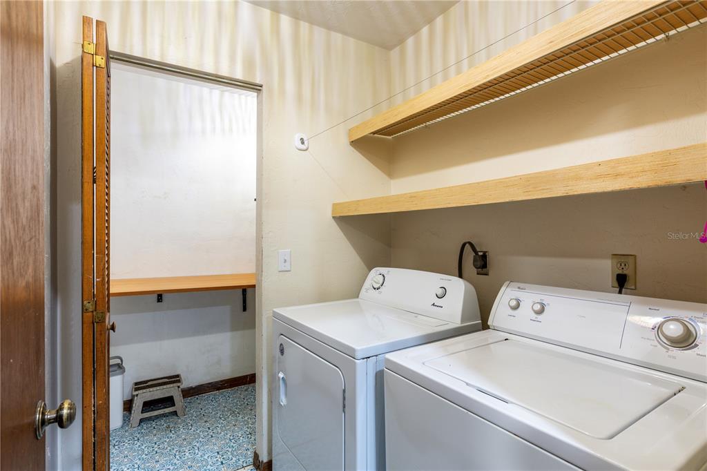 5208 Southwest 86 Terrace Gainesville, FL 32608 - Photo 21 of 26 a utility room with dryer and washer