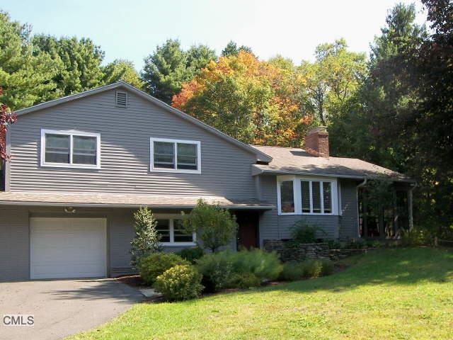 13 High Ridge Road Brookfield, CT 06804 - Photo 1 of 1 a front view of house with yard and green space