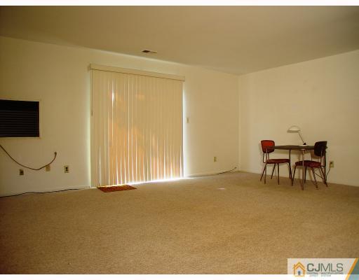 114 Redbud Road, Unit 114 Piscataway, NJ 08854 - Photo 3 of 7 a view of an empty room