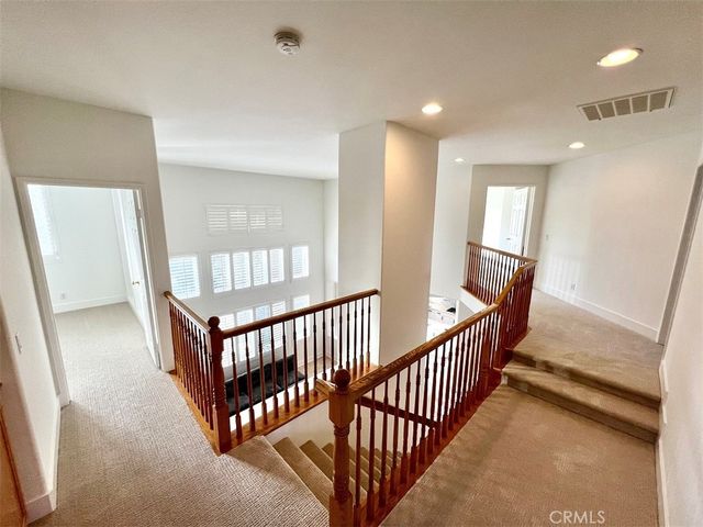 a view of hallway with bedroom