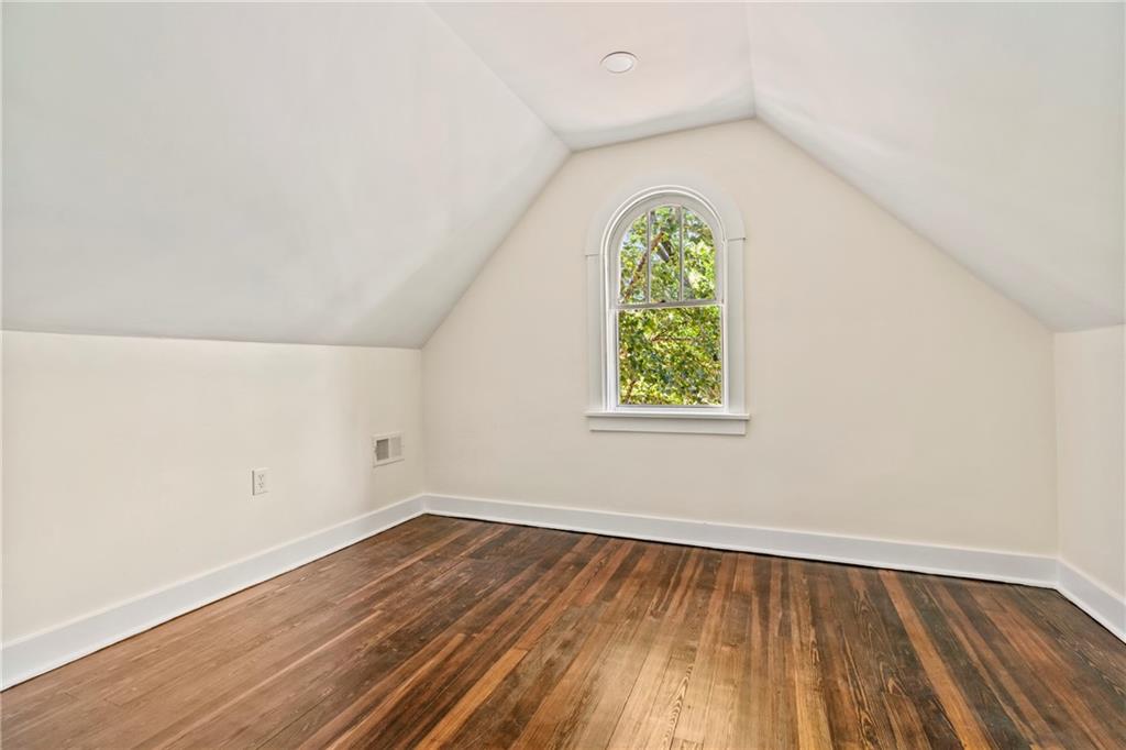 100 Race Street Pittsburgh, PA 15218 - Photo 16 of 25 an empty room with wooden floor and windows