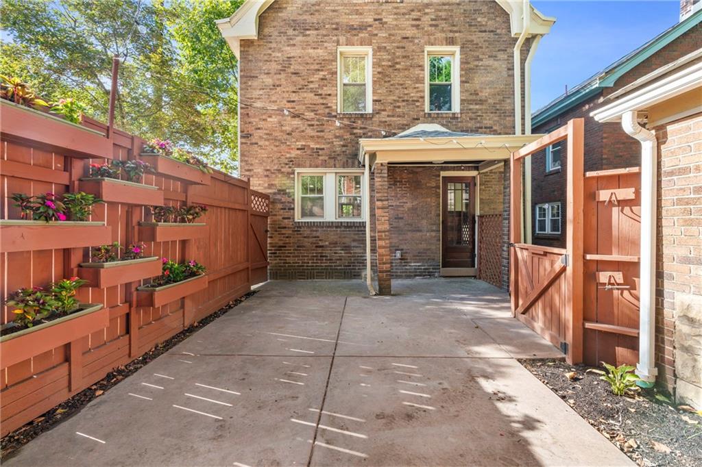 100 Race Street Pittsburgh, PA 15218 - Photo 23 of 25 a view of a brick house with large windows