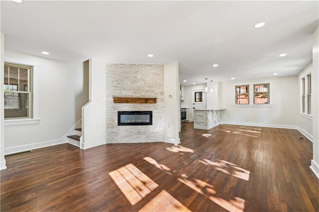 100 Race Street Pittsburgh, PA 15218 - Photo 4 of 25 a view of livingroom with furniture and a fireplace