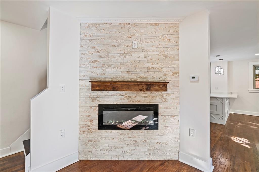 100 Race Street Pittsburgh, PA 15218 - Photo 5 of 25 a living room with a fireplace