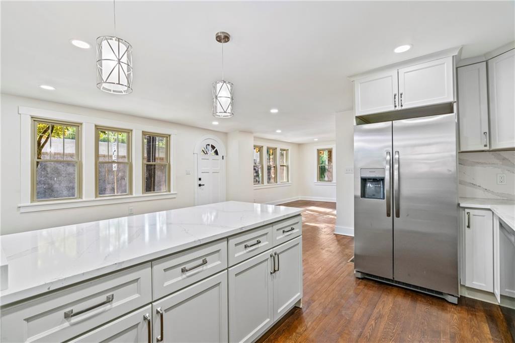 100 Race Street Pittsburgh, PA 15218 - Photo 9 of 25 a kitchen with granite countertop a refrigerator and a sink