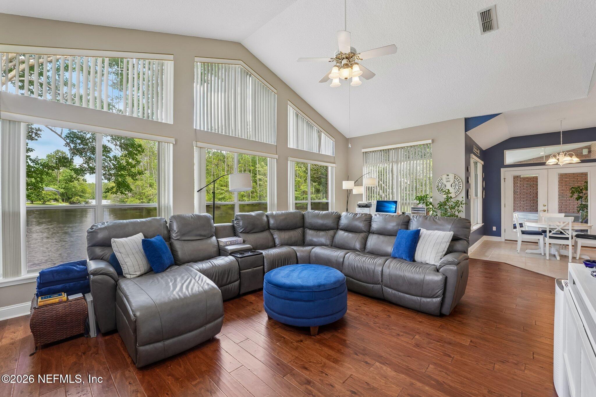 1749 Preserve Point Terrace Fleming Island, FL 32003 - Photo 19 of 60 Wall of windows Family Room