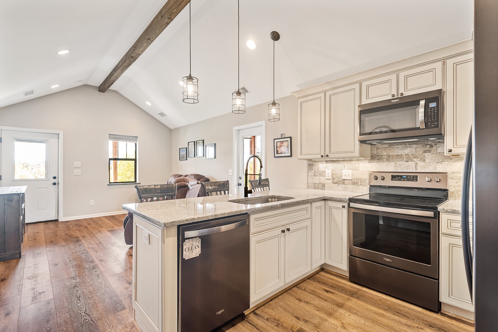 791 Coon Branch Road Alexandria, TN 37012 - Photo 11 of 33 a kitchen with a sink stove and microwave