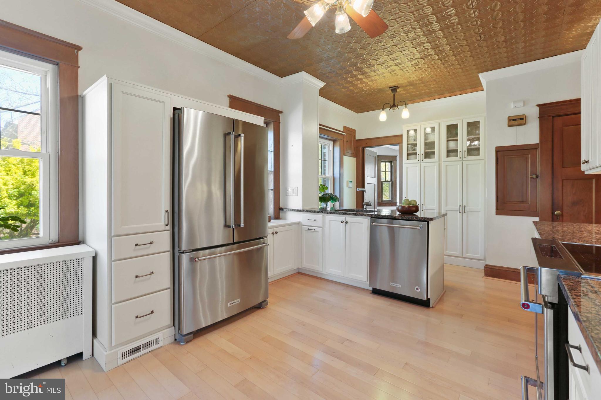 104 North Rolling Road Catonsville, MD 21228 - Photo 25 of 86 Tin ceiling and ceiling fan