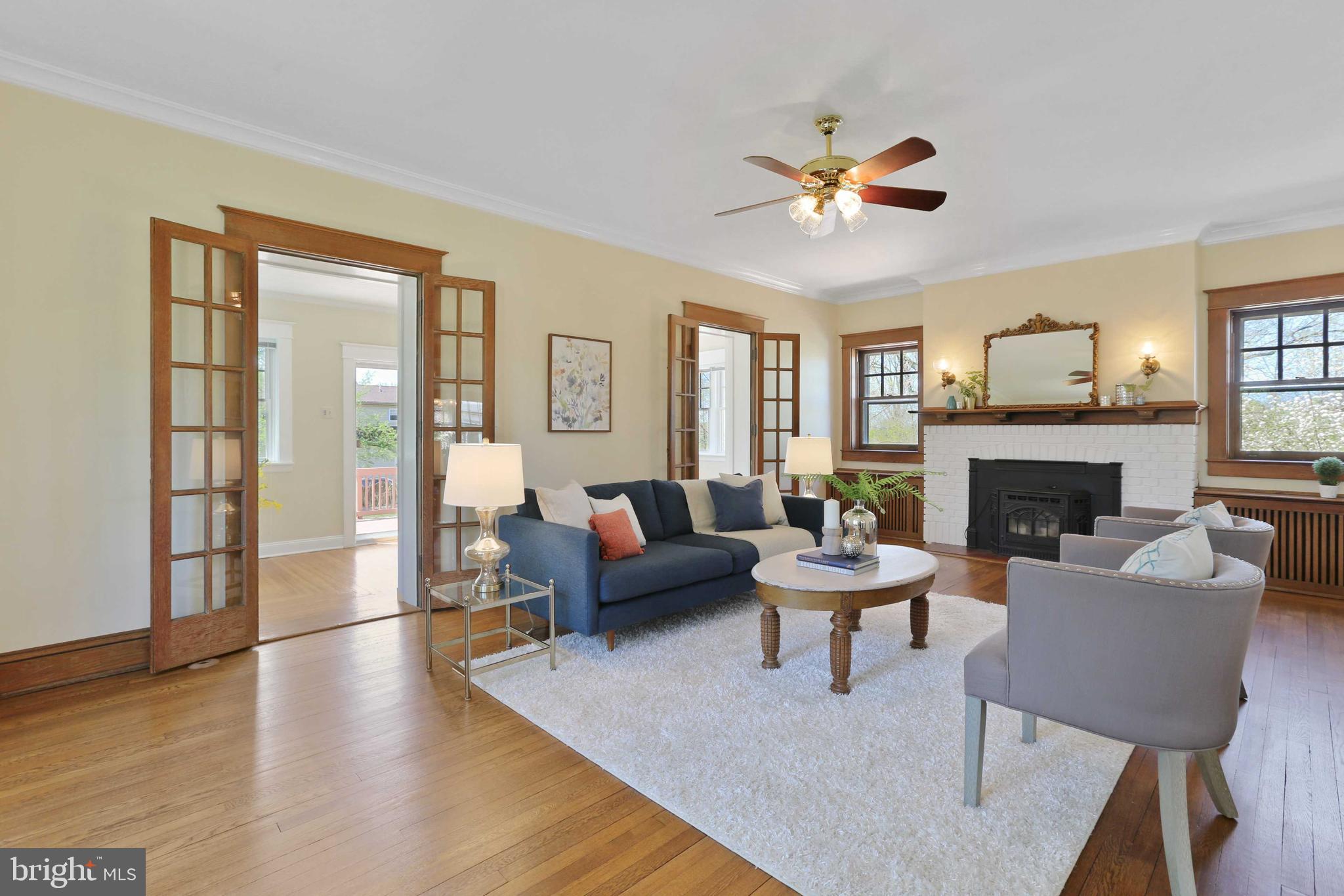 104 North Rolling Road Catonsville, MD 21228 - Photo 8 of 86 Spacious LR w/fireplace, French doors to Sunroom