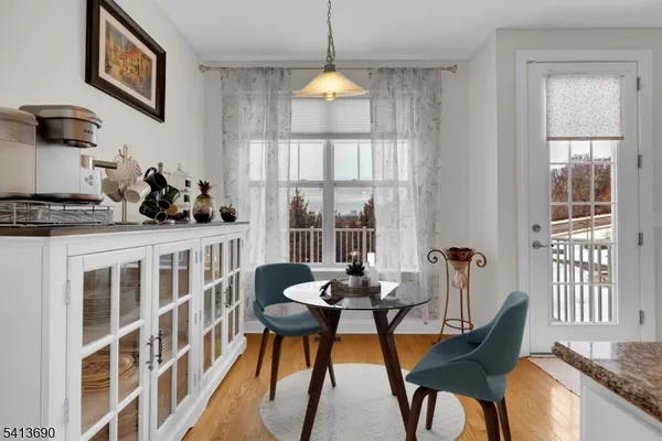a spacious bedroom with two beds and large glass window