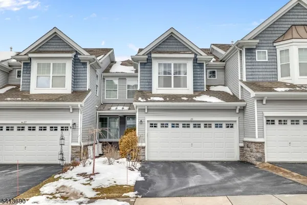 a view of kitchen with furniture and wooden floor