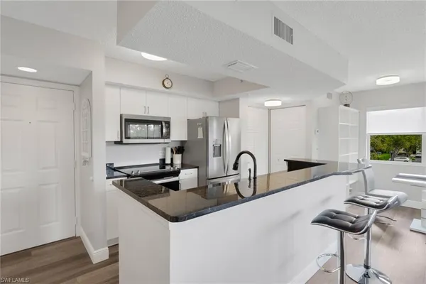 $210,000 | 8851 Colonnades Court West, Unit 131, Bonita Springs, FL 34135