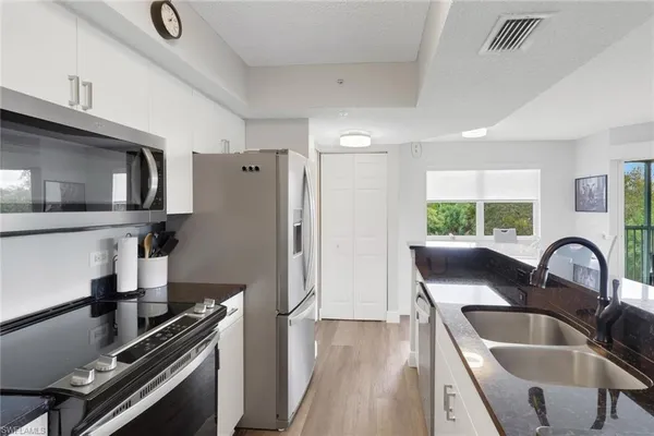 $210,000 | 8851 Colonnades Court West, Unit 131, Bonita Springs, FL 34135