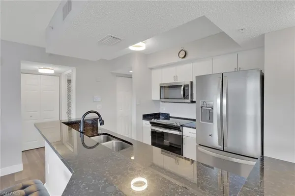 $210,000 | 8851 Colonnades Court West, Unit 131, Bonita Springs, FL 34135