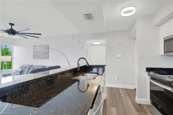 $210,000 | 8851 Colonnades Court West, Unit 131, Bonita Springs, FL 34135