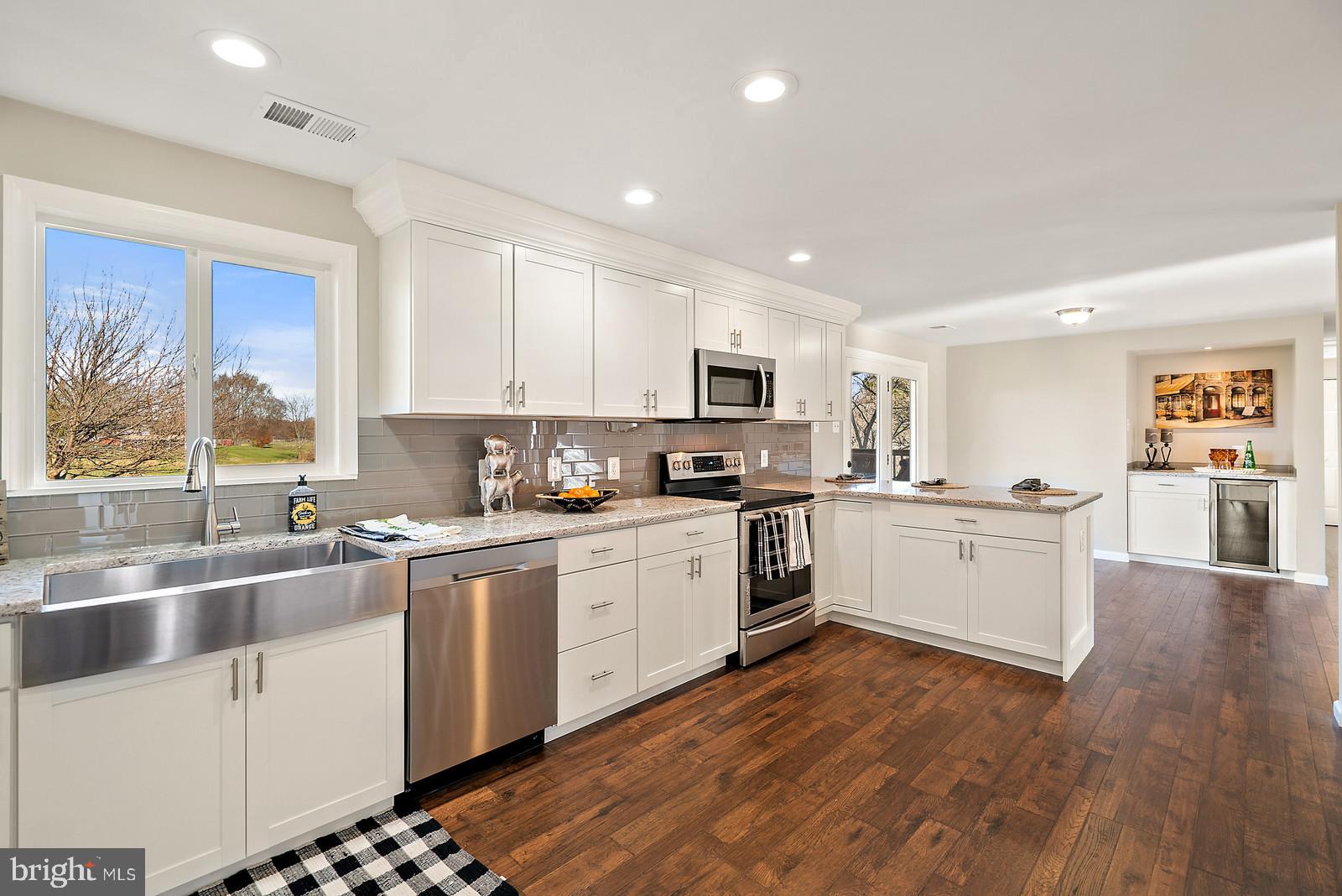 2695 Logmill Road Haymarket, VA 20169 - Photo 11 of 42 Farmhouse sink & range w/ double oven feature!