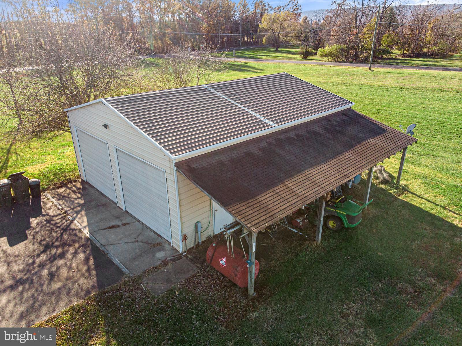 2695 Logmill Road Haymarket, VA 20169 - Photo 5 of 42 Oversized detached garage w/ run in shed.