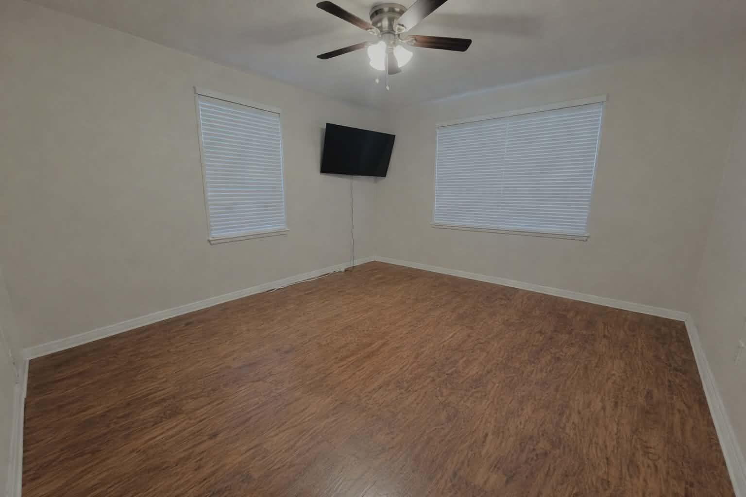 3408 38th Street Lubbock, TX 79413 - Photo 16 of 18 a view of an empty room with a window