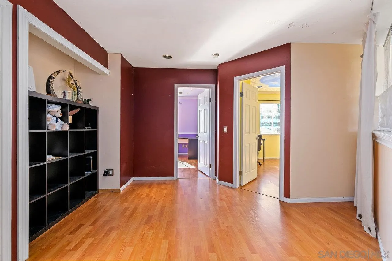863 Rydell Place El Cajon, CA 92021 - Photo 14 of 23 a view of a room with wooden floor and closet