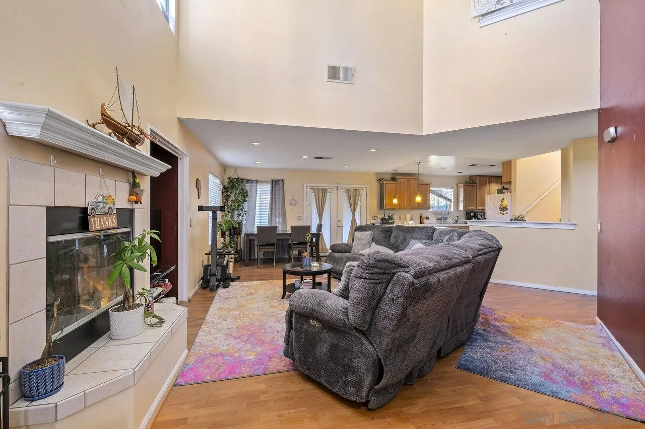 863 Rydell Place El Cajon, CA 92021 - Photo 5 of 23 a living room with furniture and a flat screen tv