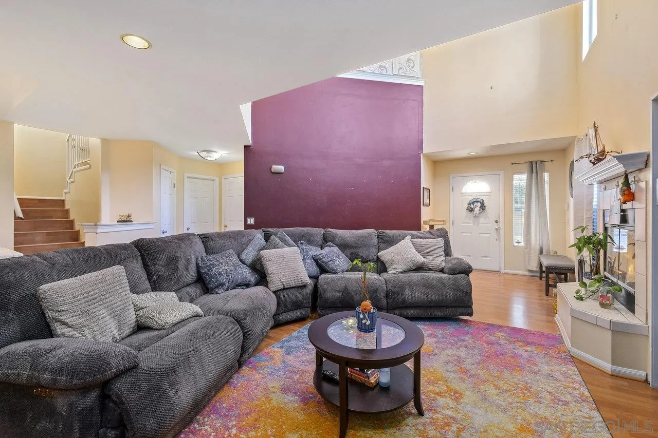 863 Rydell Place El Cajon, CA 92021 - Photo 6 of 23 a living room with furniture and a wooden floor