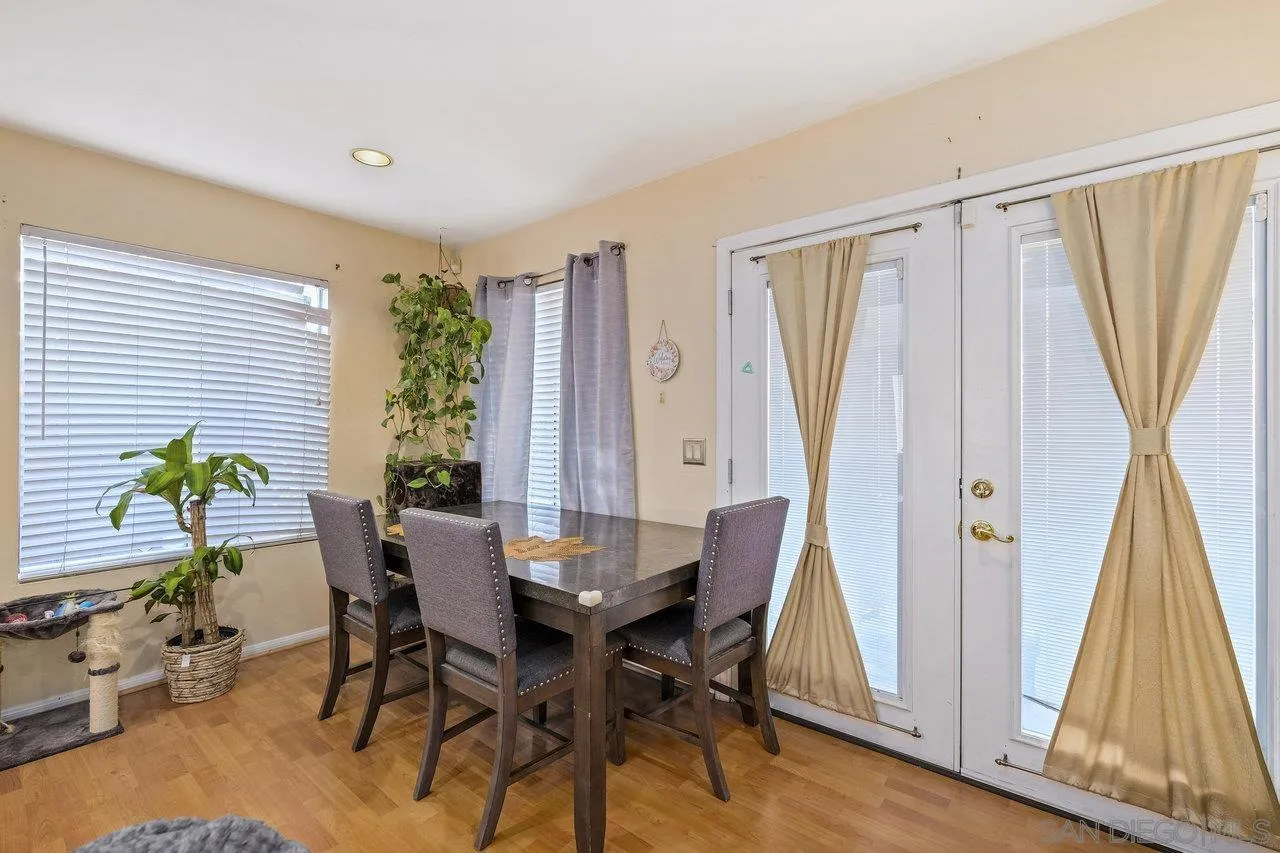 863 Rydell Place El Cajon, CA 92021 - Photo 8 of 23 a view of a dining room with furniture and a window