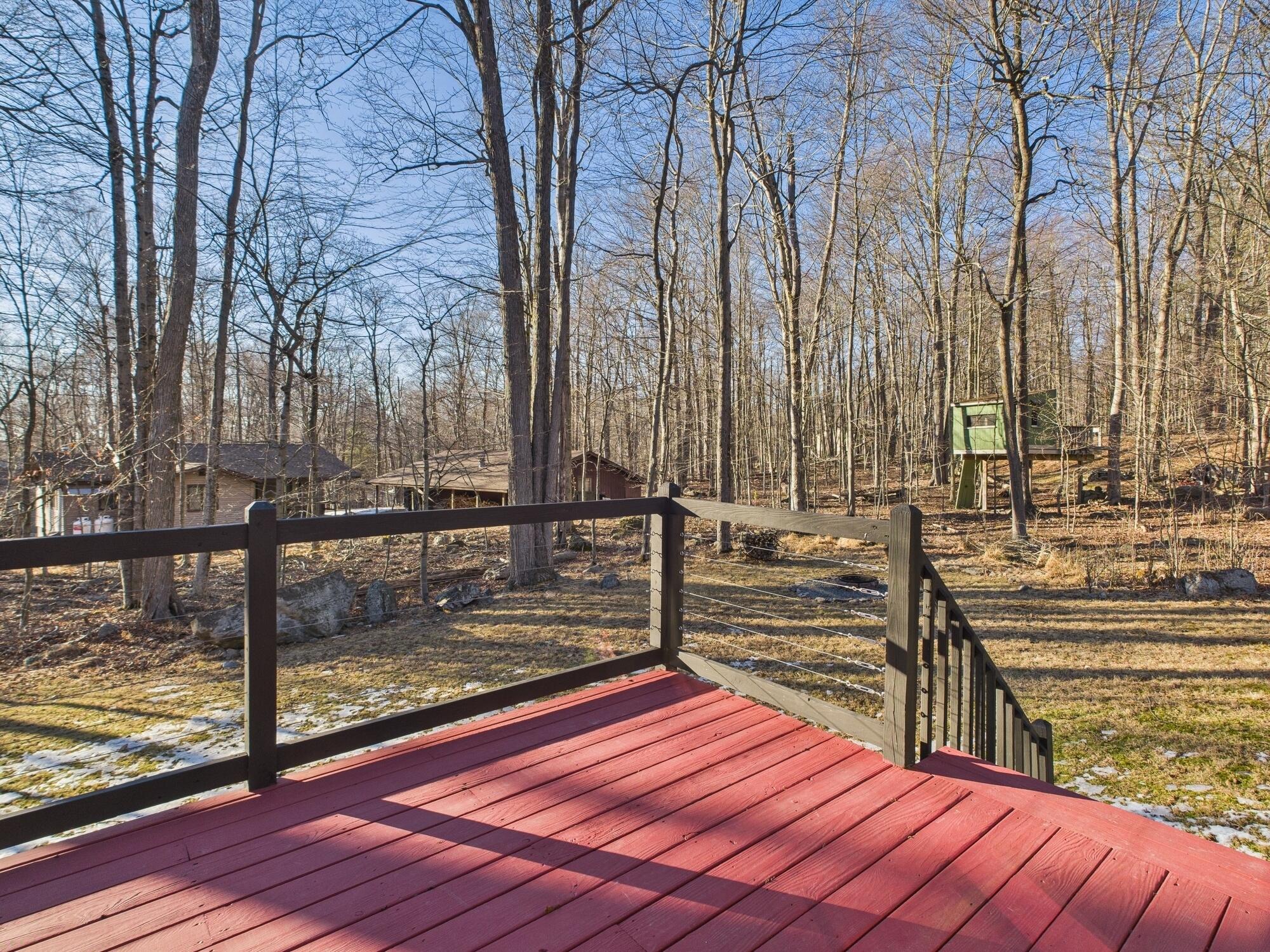 193 Elk Run Road Pocono Lake, PA 18347 - Photo 42 of 51 a view of swimming pool with outdoor seating and plants