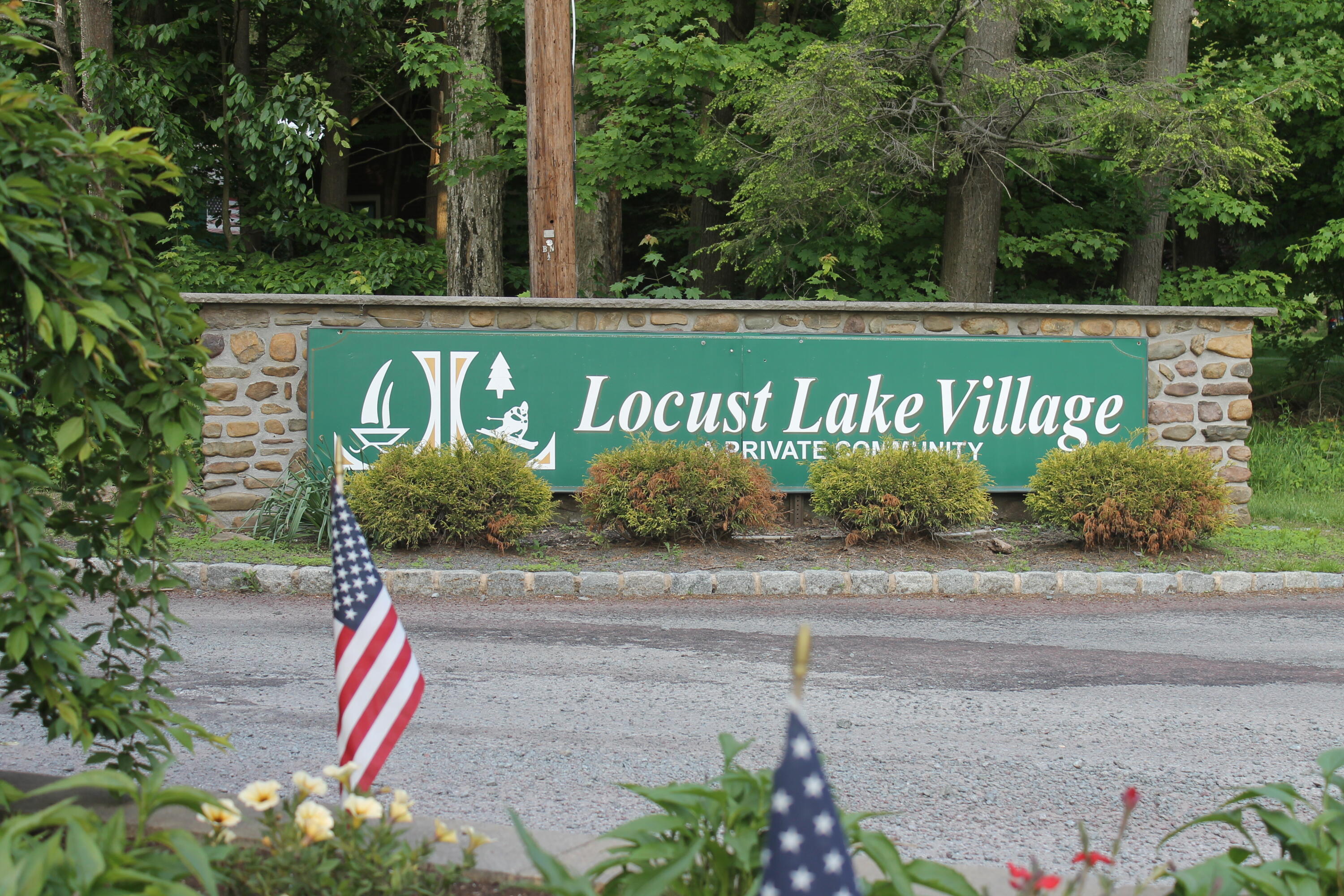 193 Elk Run Road Pocono Lake, PA 18347 - Photo 46 of 51 a view of a street with benches in the background