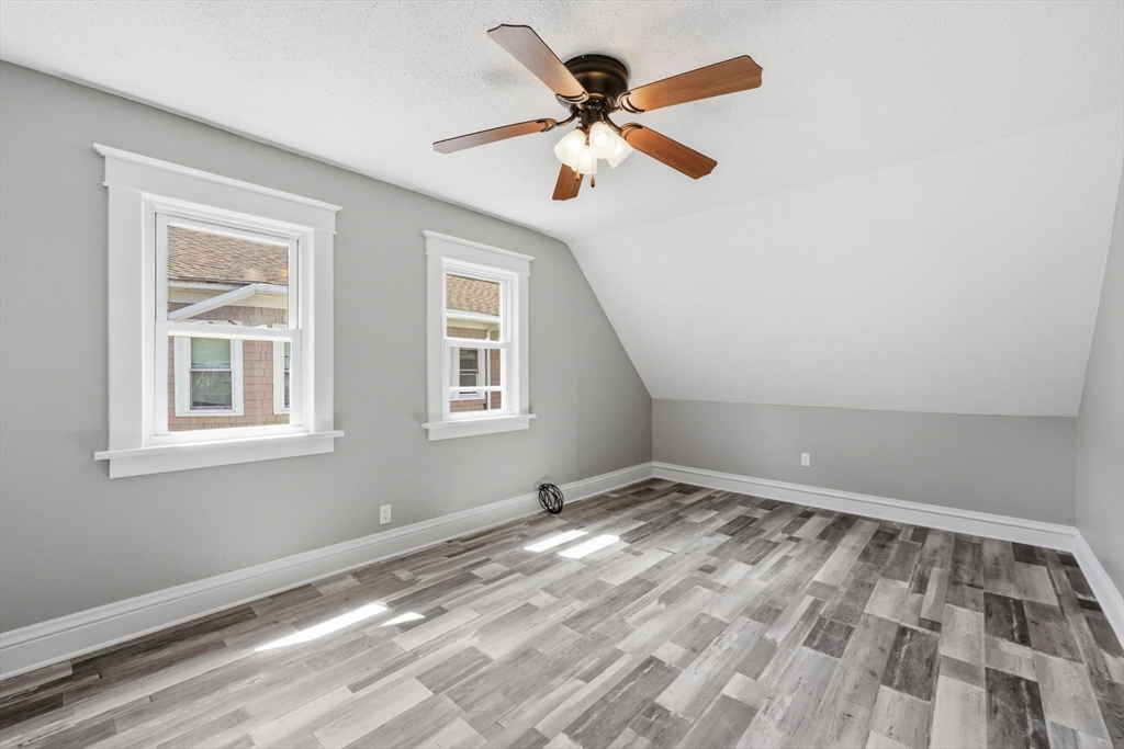62 Kenyon Street Springfield, MA 01109 - Photo 15 of 26 a view of empty room with wooden floor
