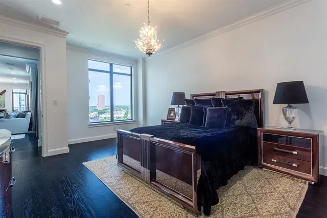 a bed room with a bed and dresser