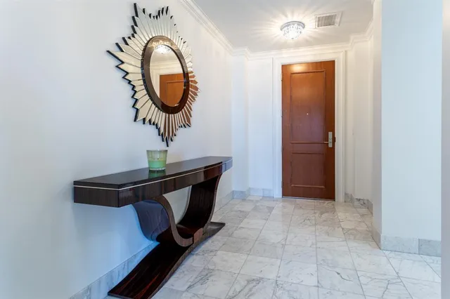 a view of a hallway with entryway