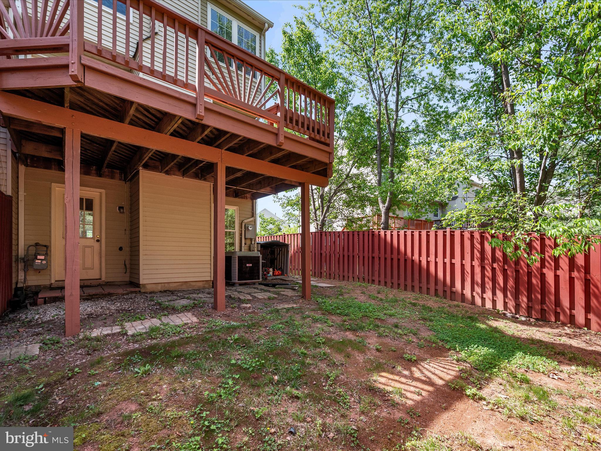 20760 Apollo Terrace Ashburn, VA 20147 - Photo 31 of 50 a view of a chair and table in the backyard
