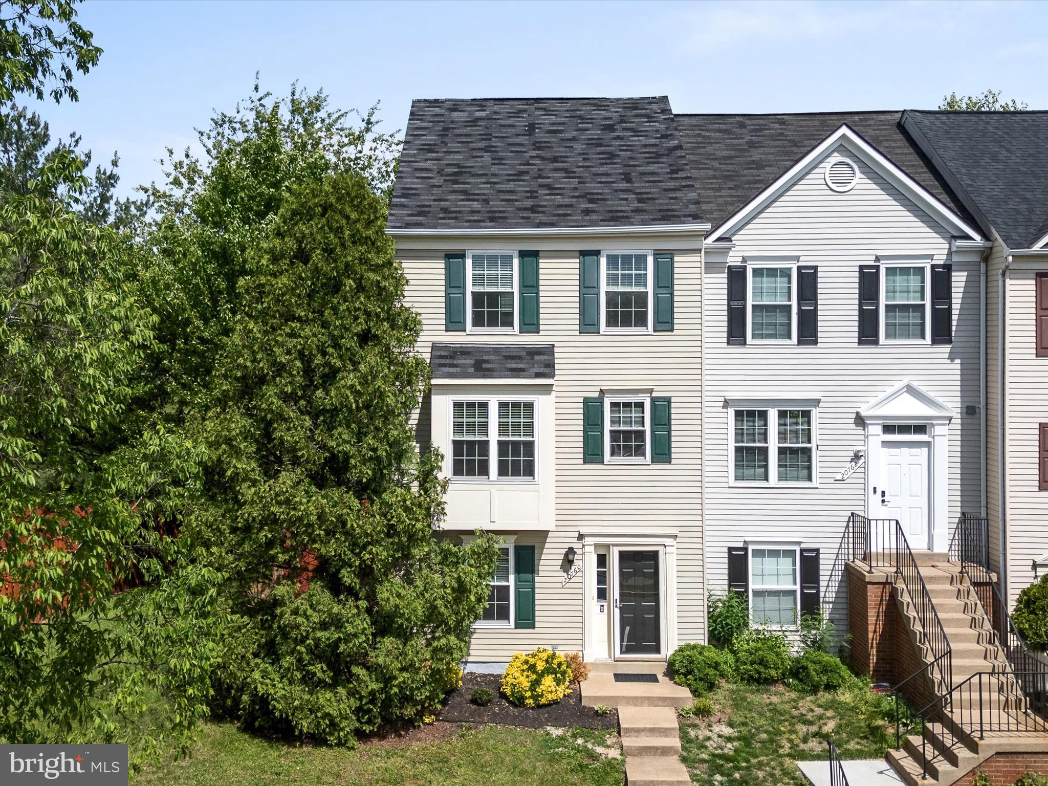 20760 Apollo Terrace Ashburn, VA 20147 - Photo 33 of 50 a view of a yard in front of a house
