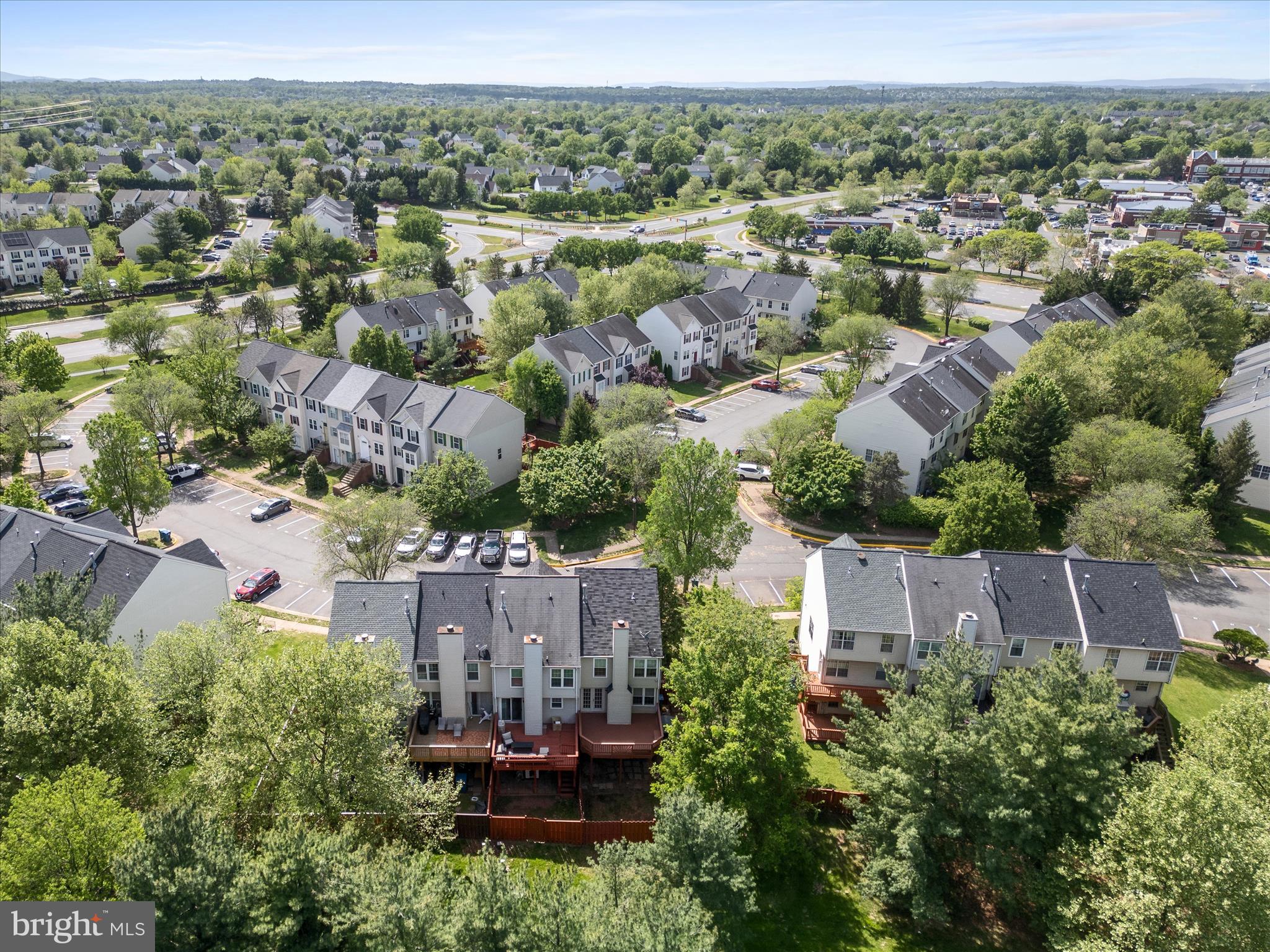 20760 Apollo Terrace Ashburn, VA 20147 - Photo 39 of 50 an aerial view of a house with a yard