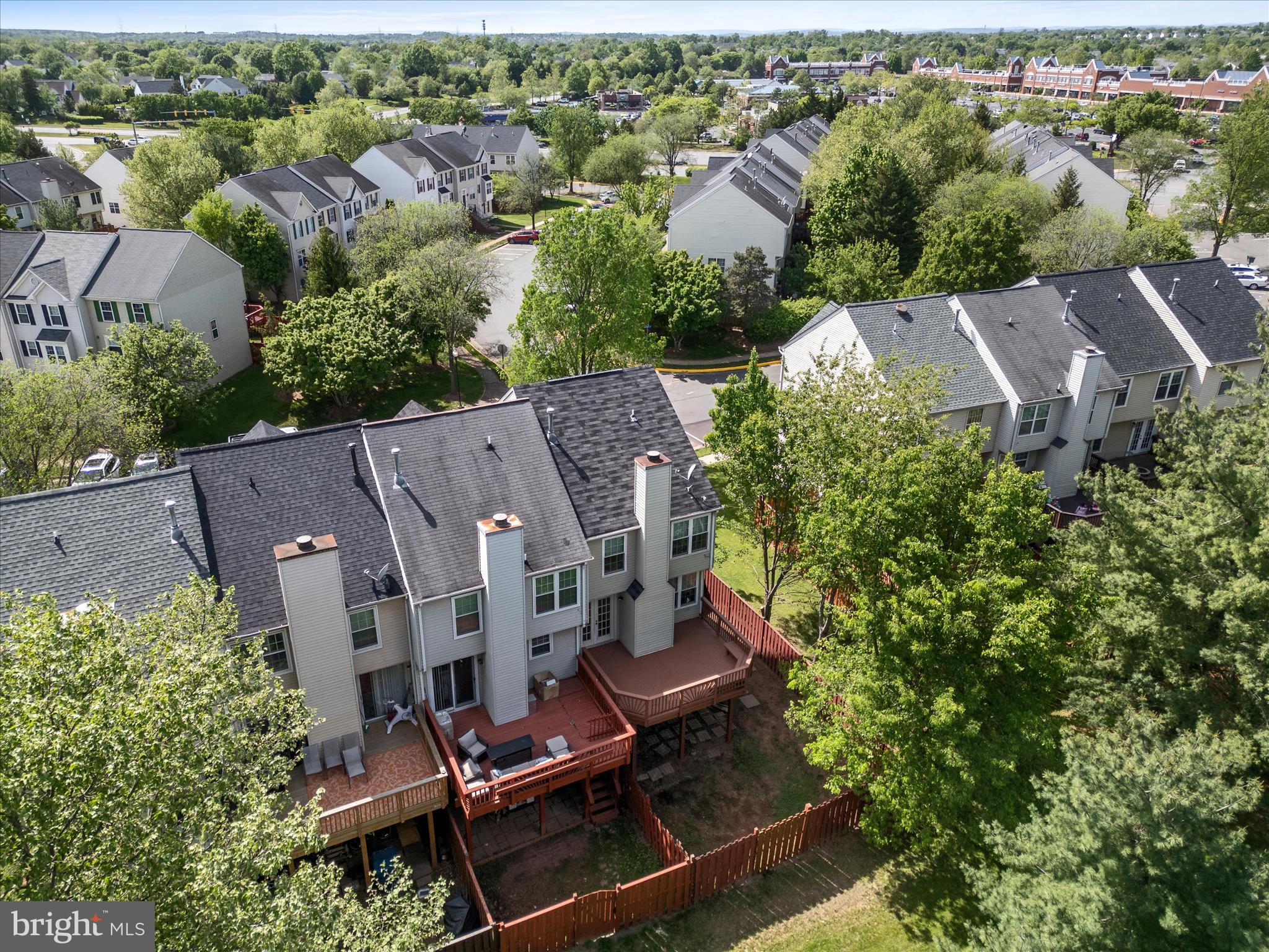 20760 Apollo Terrace Ashburn, VA 20147 - Photo 41 of 50 an aerial view of a house with yard and outdoor seating