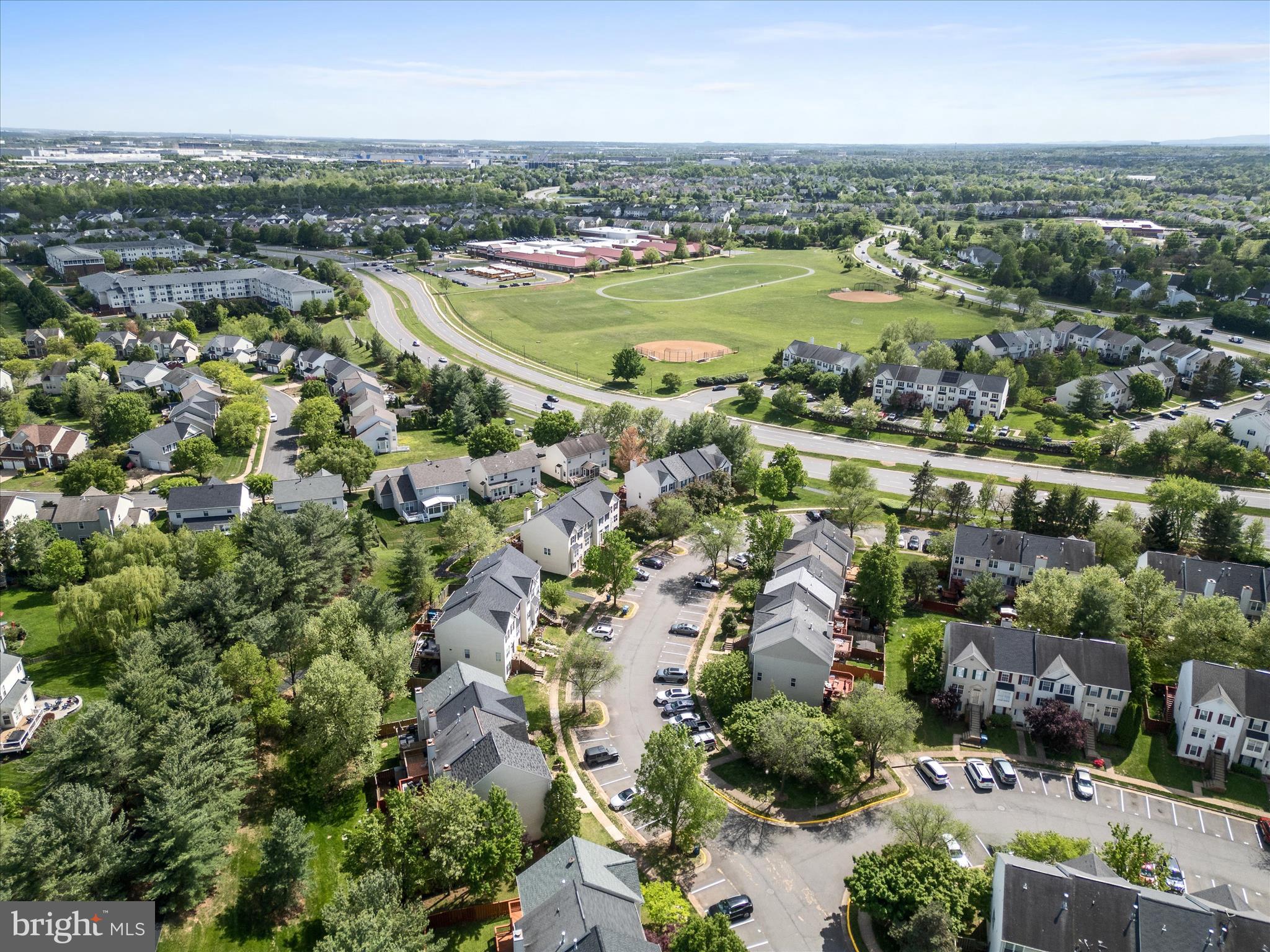 20760 Apollo Terrace Ashburn, VA 20147 - Photo 42 of 50 an aerial view of a city with lots of residential buildings