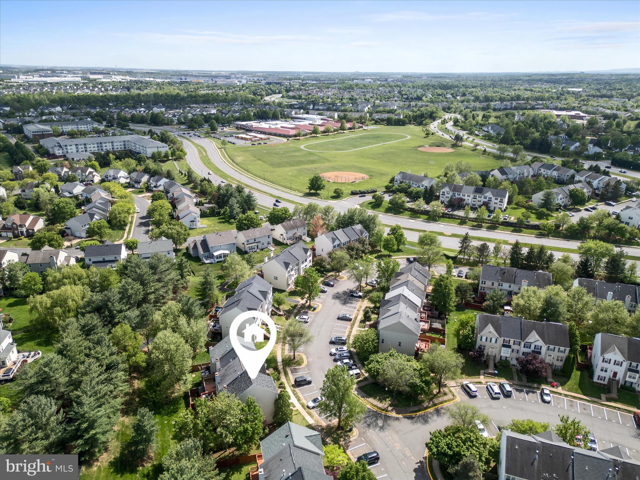 20760 Apollo Terrace Ashburn, VA 20147 - Photo 43 of 50 an aerial view of a city with lots of residential buildings