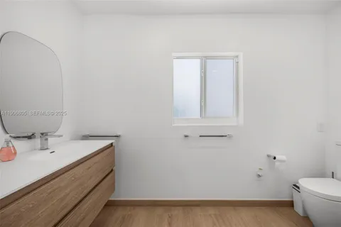 a bathroom with a sink and a toilet