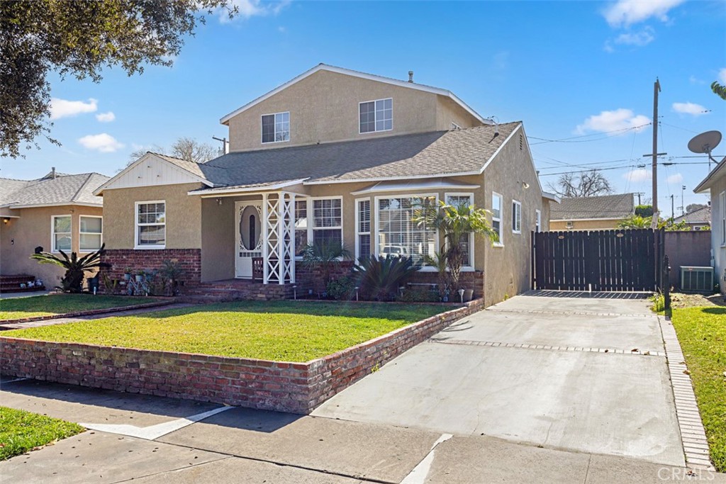 Front Exterior w/ Long Driveway