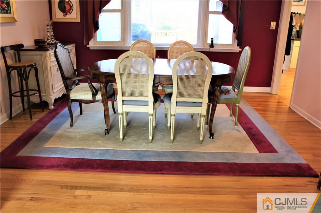 23 Clive Hills Road Edison, NJ 08820 - Photo 5 of 25 a view of dining room and hall with furniture