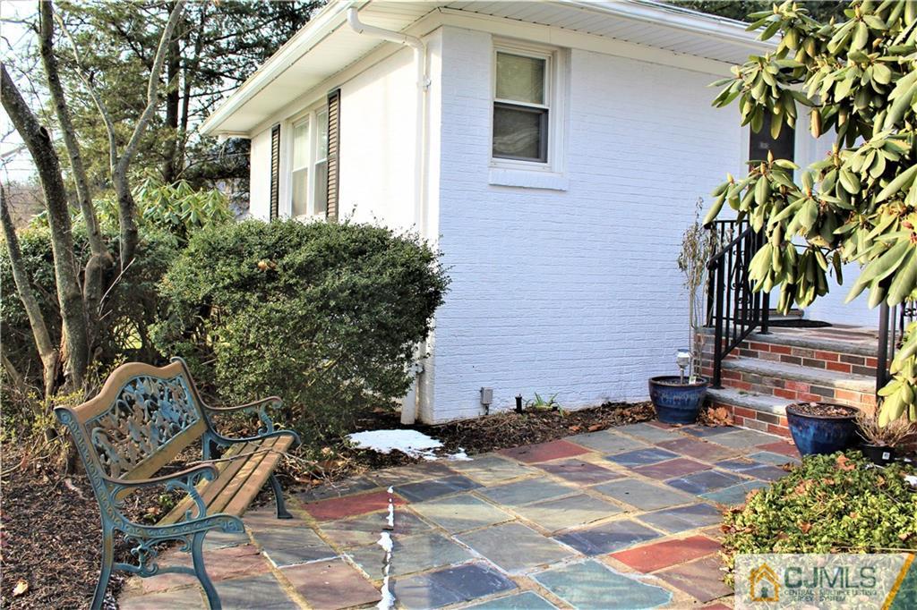 23 Clive Hills Road Edison, NJ 08820 - Photo 10 of 25 a view of a house with a patio