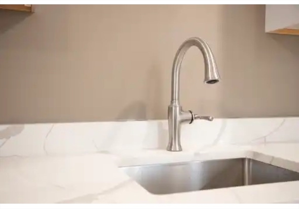 63 Progressive Street Worcester, MA 01604 - Photo 6 of 22 a bath tub sitting in a bathroom