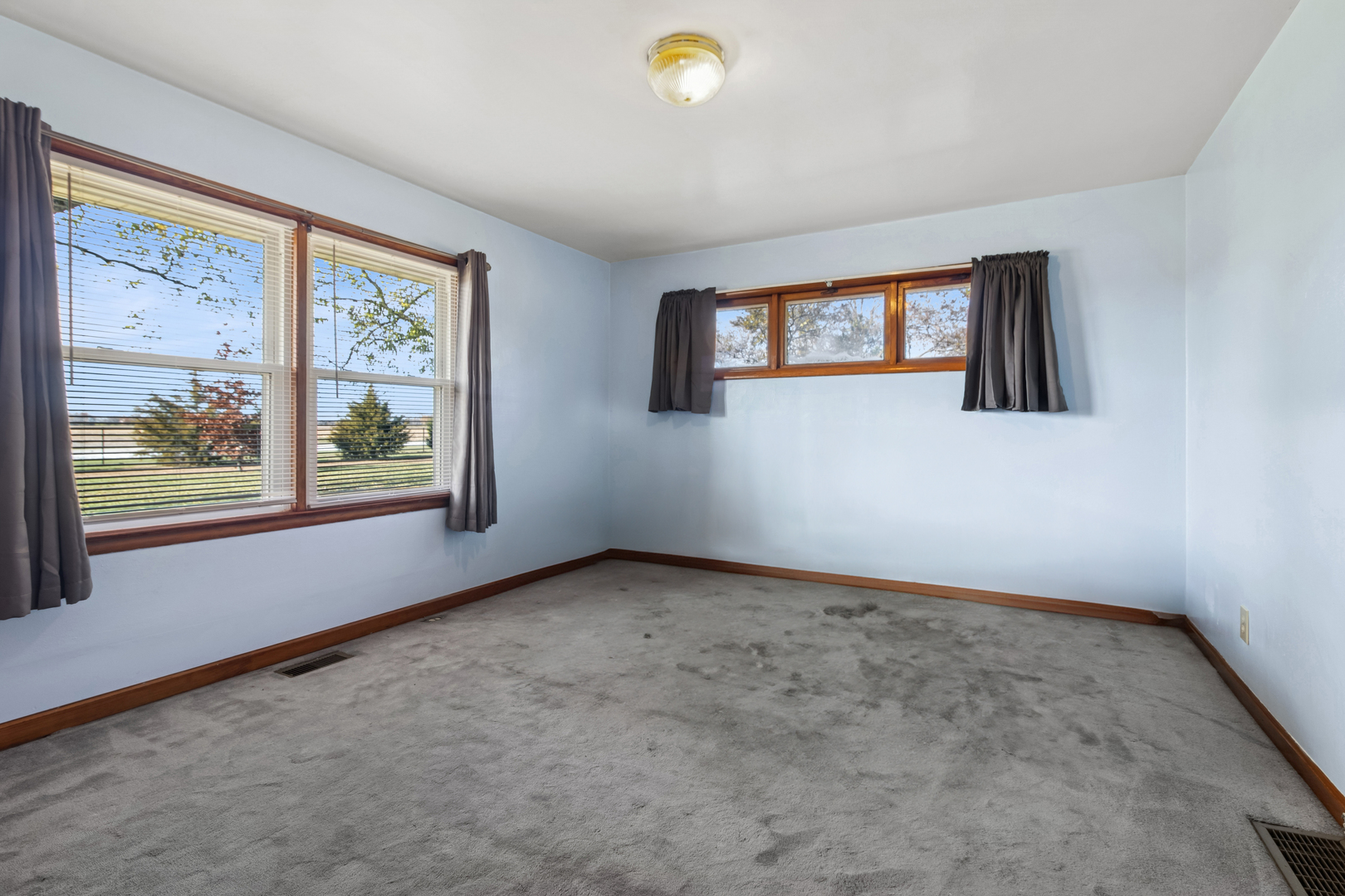 3030 South Berta Road Braceville, IL 60407 - Photo 18 of 24 a view of an empty room with a window