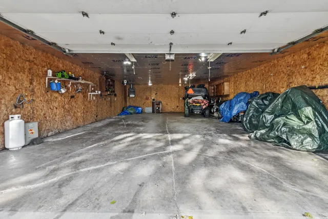 a view of a street with a big yard