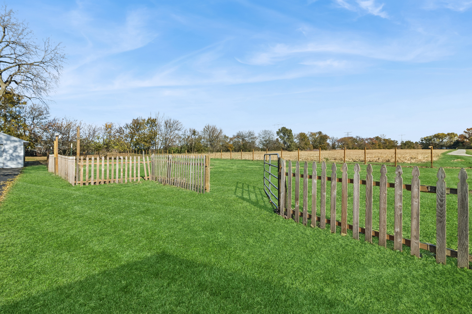 3030 South Berta Road Braceville, IL 60407 - Photo 22 of 24 a view of a pathway with a garden