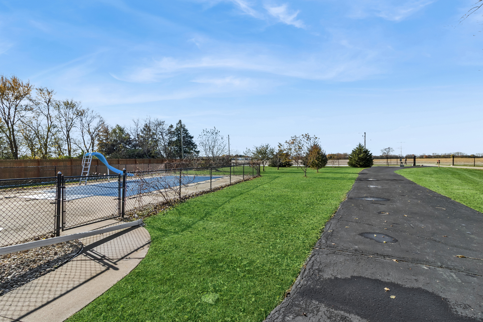 3030 South Berta Road Braceville, IL 60407 - Photo 23 of 24 a view of a street with a big yard
