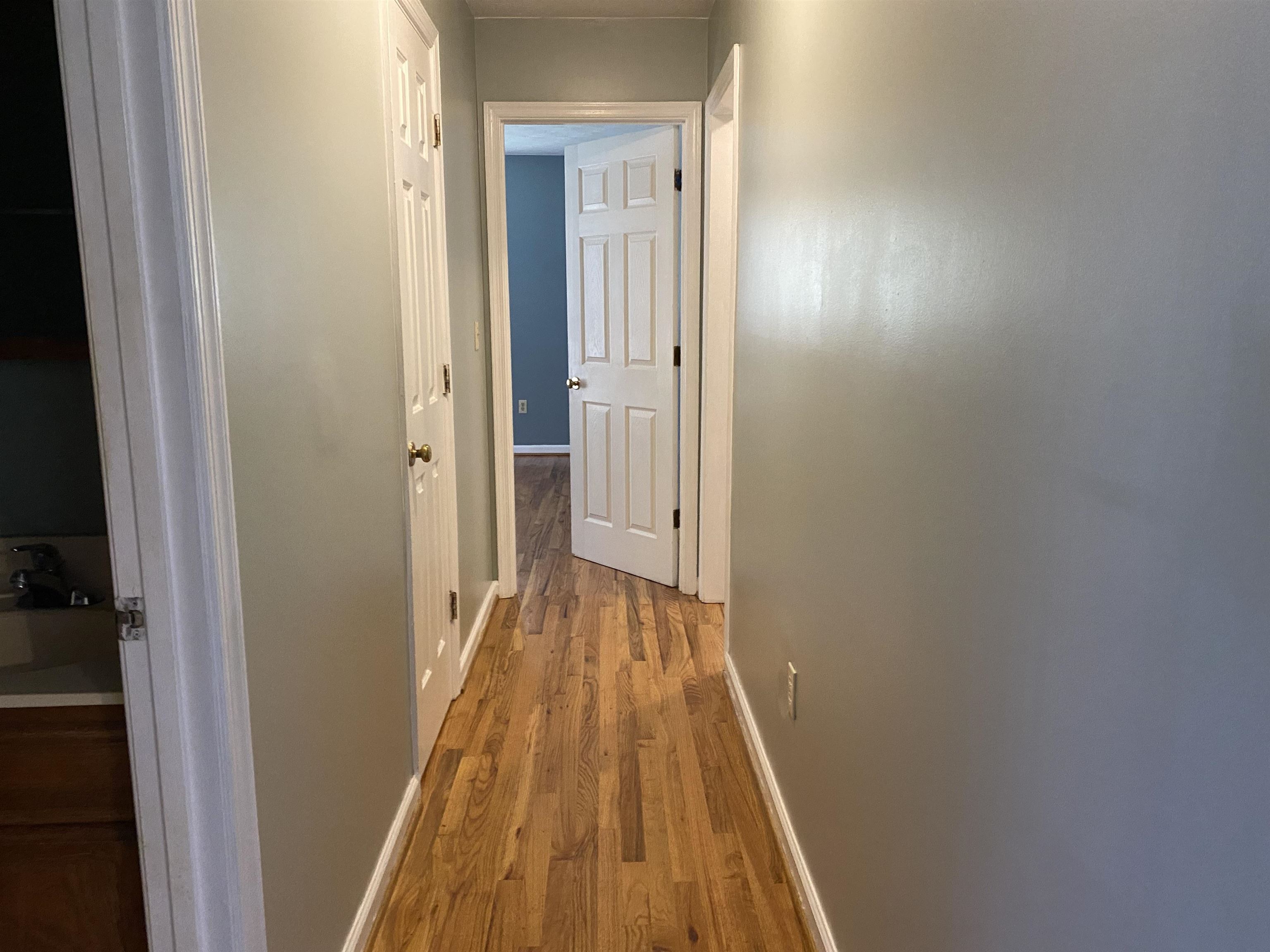 544 Hull Street Staunton, VA 24401 - Photo 6 of 18 a view of a hallway with wooden floor