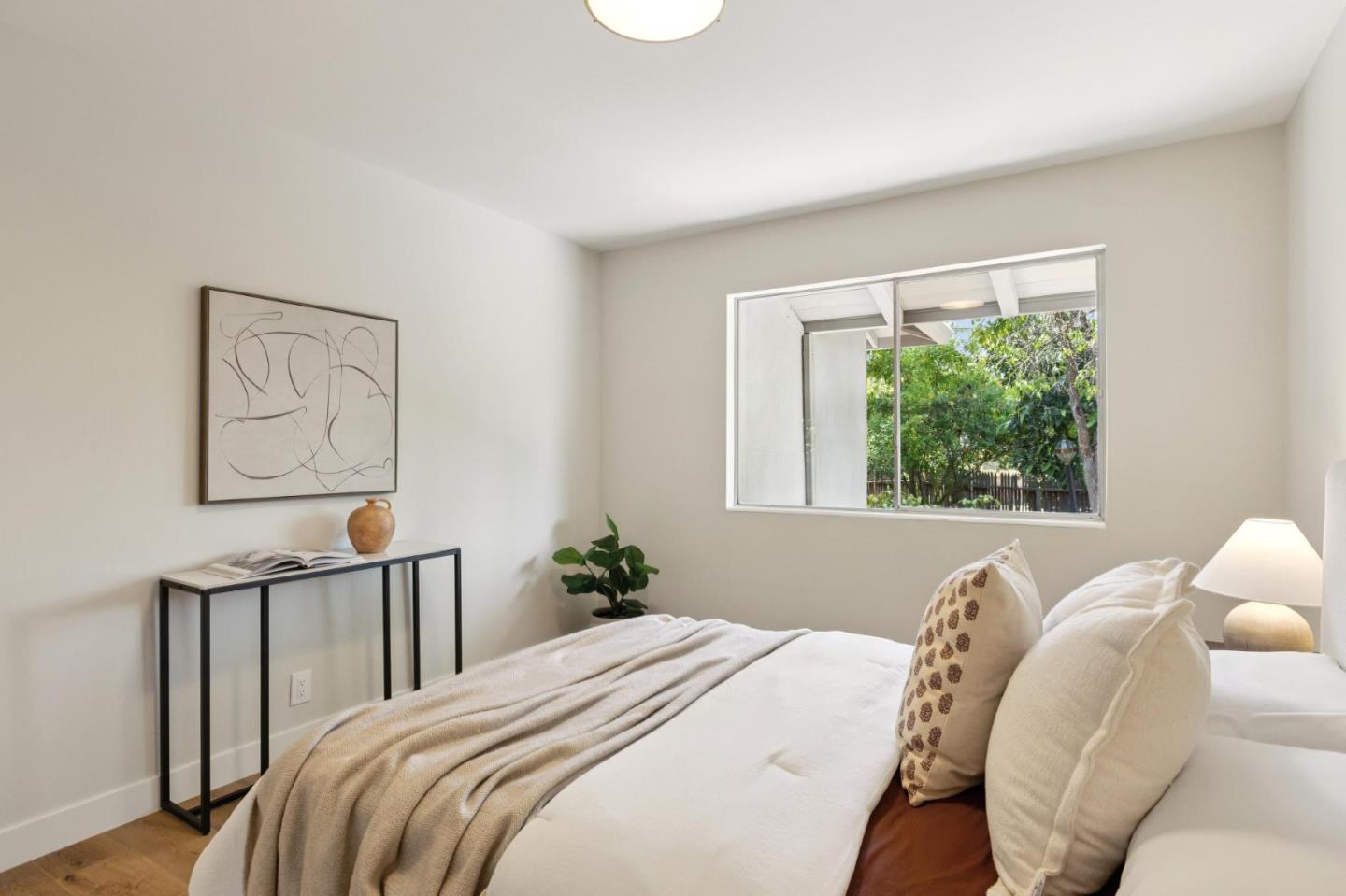 755 Santa Rita Avenue Los Altos, CA 94022 - Photo 33 of 50 a bedroom with a bed and a window