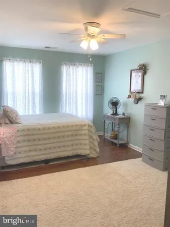 a view of livingroom with furniture and wooden floor