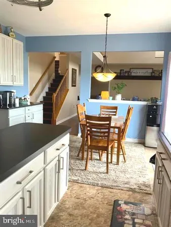 a bathroom with a toilet and a sink